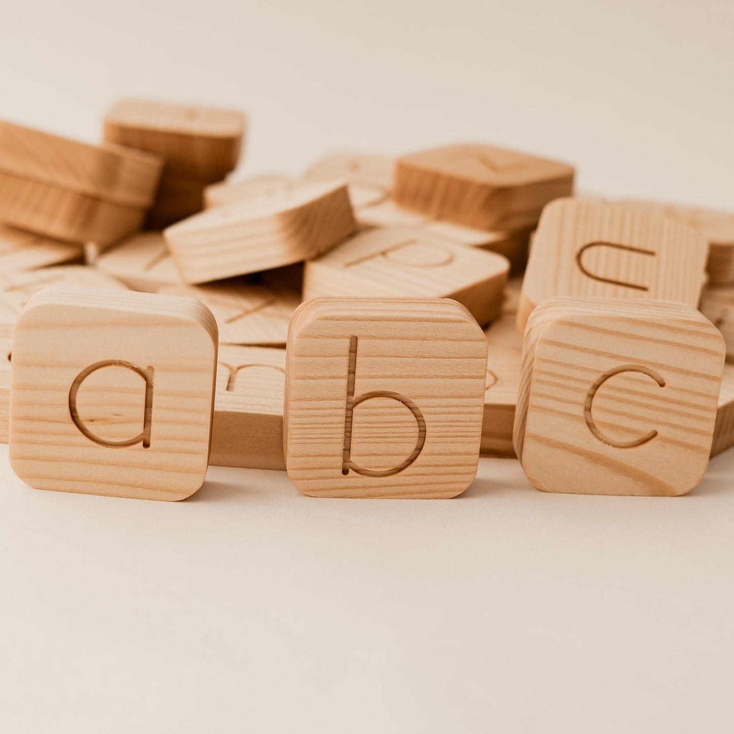 Wooden blocks with letters on a light background